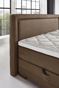 Boxspringbett Whistler – Rahmen-Steppung, Kunstleder Braun – Kopfteil-Nahaufnahme | Betten Deluxe