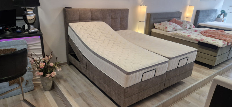 Ausstellungsbett Van Gogh 180x200 cm – grau Leder – elektrisch verstellbar – fester Liegekomfort