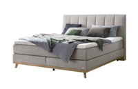 Faro Boxspringbett in Hellgrau mit gestepptes Kopfteil, Größen 140×200 / 160×200 / 180×200 / 200×200 cm – Betten Deluxe