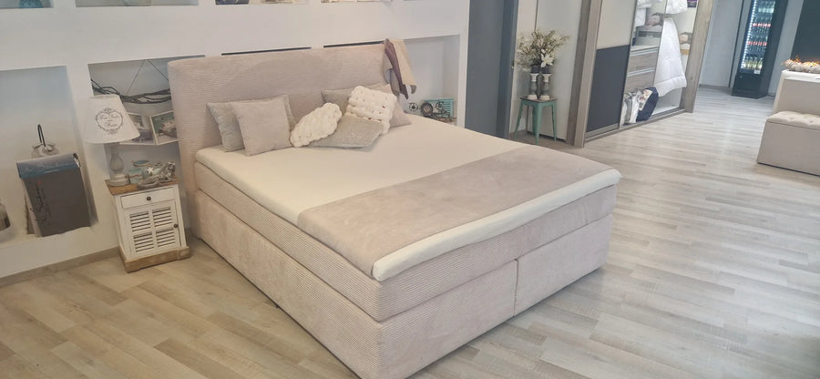 Ausstellungsstück Boxspringbett 180x200 cm Cord Beige mit Bettkasten – Betten Deluxe Düsseldorf